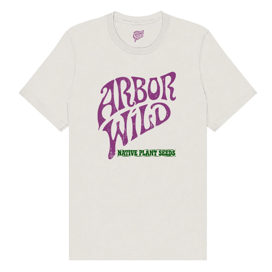 An vintage off-white crewneck t-shirt featuring a purple graphic that reads 'ARBOR WILD' in a stylized font, with 'NATIVE PLANT SEEDS' printed in green underneath.