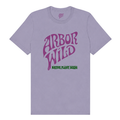 A light purple crewneck t-shirt featuring a stylized purple 'ARBOR WILD' logo on the chest with 'NATIVE PLANT SEEDS' printed in green underneath.